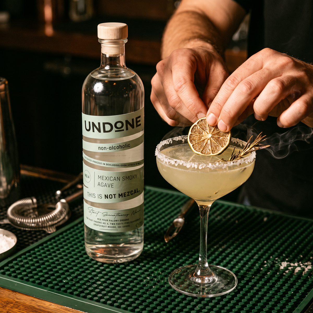 Bartender garnishing a smoky Margarita beside the UNDONE No. 4 NOT MEZCAL bottle