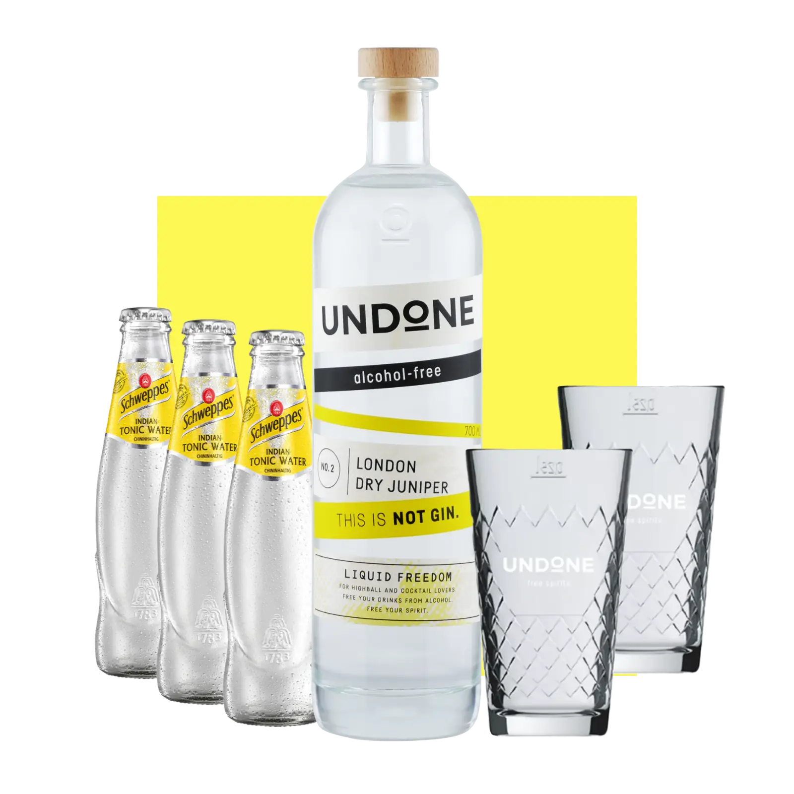 Eine Flasche Undone Dry Juniper mit zwei Gläsern und drei Flaschen Tonic Water, Undone Gin Tonic Bundle